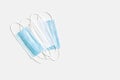 Top view protective colorful face masks Coronavirus prevention medical surgical masks white and blue colored.