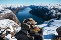 Top view of the Pulpit Rock, Preikestolen. Scenic landscape of river channel between rocky shore. Norwegian mountains