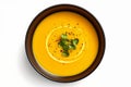 Top view of pumpkin and carrot cream soup on white. Generative AI
