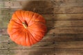 Top view of pumpkin on old wooden floor