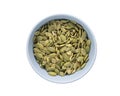 Top view pumpkin seeds in blue bowl isolated on white background Royalty Free Stock Photo