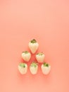 top view of a pyramid composition with strawberries in rows