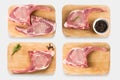 Top view raw bone-in pork rib chops steak set isolated on white background. Royalty Free Stock Photo