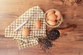 Top view of raw eggs in the basket and Straw or chaff with Egg beater. Royalty Free Stock Photo