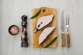 Top view of raw fresh halibut steak on wooden cutting board Royalty Free Stock Photo