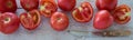 Top view of raw garden tomatoes. Wooden background