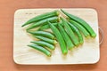 Top View of Raw Okra on Wooden Board Royalty Free Stock Photo