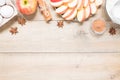 Top view raw ingredients for cooking apple pie on wooden background with copy space. Bakery background Royalty Free Stock Photo