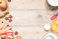 Top view raw ingredients for cooking apple pie on wooden background with copy space. Bakery background Royalty Free Stock Photo