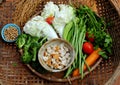 Top view raw material for Vietnamese vegetarian dish, boiled vegetables and vegan braised sauce