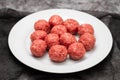 Top view of raw meat balls on small plate Royalty Free Stock Photo