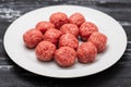 Top view of raw meat balls on small plate Royalty Free Stock Photo