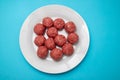 Top view of raw meat balls on small plate Royalty Free Stock Photo