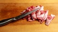 Top view raw pork chop steak and garlic, pepper on wooden background. Royalty Free Stock Photo