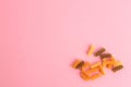 Top view of raw spiral pasta on a pink background Royalty Free Stock Photo