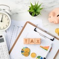 Top view of calculating and paying tax concept on marble white table Royalty Free Stock Photo