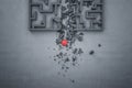 Top view of red ball breaks gray maze