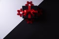 Top view of red and black christmas boxes on black background with copy space for text. black Friday composition Royalty Free Stock Photo