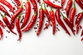 Top view of red chilli peppers and peppercorns on white Royalty Free Stock Photo