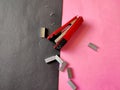 Top view of Red color stapler and pile of stapler pins Royalty Free Stock Photo