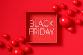 Top view of a red empty gift box with red spheres with the word Black Friday Royalty Free Stock Photo