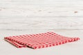 top view with red empty kitchen napkin  on table background. Folded cloth for mockup with copy space, Flat lay Royalty Free Stock Photo