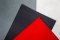 Top view of red, grey, black, and white papers background and texture Royalty Free Stock Photo