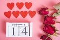 Top view of red Hearts and calendar on pink background Royalty Free Stock Photo