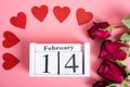 Top view of red Hearts and calendar on pink background Royalty Free Stock Photo