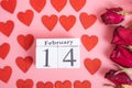 Top view of red Hearts and calendar on pink background Royalty Free Stock Photo