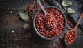 Top view of red legumes on a dark wooden kitchen table. Healthy food concept and detox or vegan menu. World Pulses Day. Copy Space