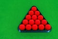 Top view 15 red snooker balls in a black frame on a green velvet snooker table Royalty Free Stock Photo