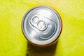 Top view of red soda can on yellow background Royalty Free Stock Photo