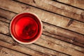 Top of view of red wine in the glass on wood background Royalty Free Stock Photo