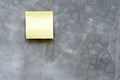 Top view of reminder yellow sheet isolated on wooden background Royalty Free Stock Photo