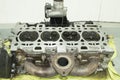 Top view of the removed and inverted engine cylinder head, which is lying on the table Royalty Free Stock Photo