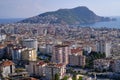 Top view of the residential areas of the city, the chain of hotels and the seaside resort town on a sunny day