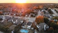 Top view residential houses with pool near expressway at autumn sunset suburbs Dallas
