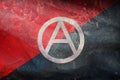 Top view of retro flag of Anarchist with A symbol with grunge texture. Anarchism symbol. no flagpole. Plane design, layout. Flag