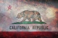 Top view of retro flag of California with grunge texture. Flag background