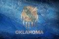 Top view of retro flag of Oklahoma with grunge texture. Flag background
