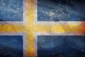 Top view of retro flag Regional Roslagen, Sweden with grunge texture. Swedish patriot and travel concept. no flagpole. Plane Royalty Free Stock Photo