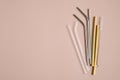 Top view reusable drinking straws made from glass, bamboo, stainless steel. Sustainable lifestyle. Zero waste, plastic free