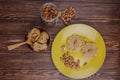 top view of rice cereal cracker with peanut paste butter almond in a glass jar and a bowl with peanut butter on wooden background Royalty Free Stock Photo