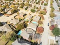 Top view a rich subdivision neighborhood with cul-de-sac and bright autumn leaves Royalty Free Stock Photo