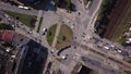 Top view of the road junctions. Aerial survey of highways of the road network. Machines moving at the intersection and denouement.