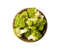 Top view. Roman cauliflower on wooden bowl isolated on white. Roman cauliflower close up. Fractal texture of romanesco broccoli. Royalty Free Stock Photo