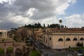 Top view of the Roman Forum against a dramatic sky. Ancient architecture and the urban landscape of historical Rome Royalty Free Stock Photo