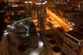 Top view of the roof of night newly built business center inmodern residential quarter with futuristic illumination.