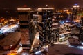 Top view of the roof of night newly built business center inmodern residential quarter with futuristic illumination.